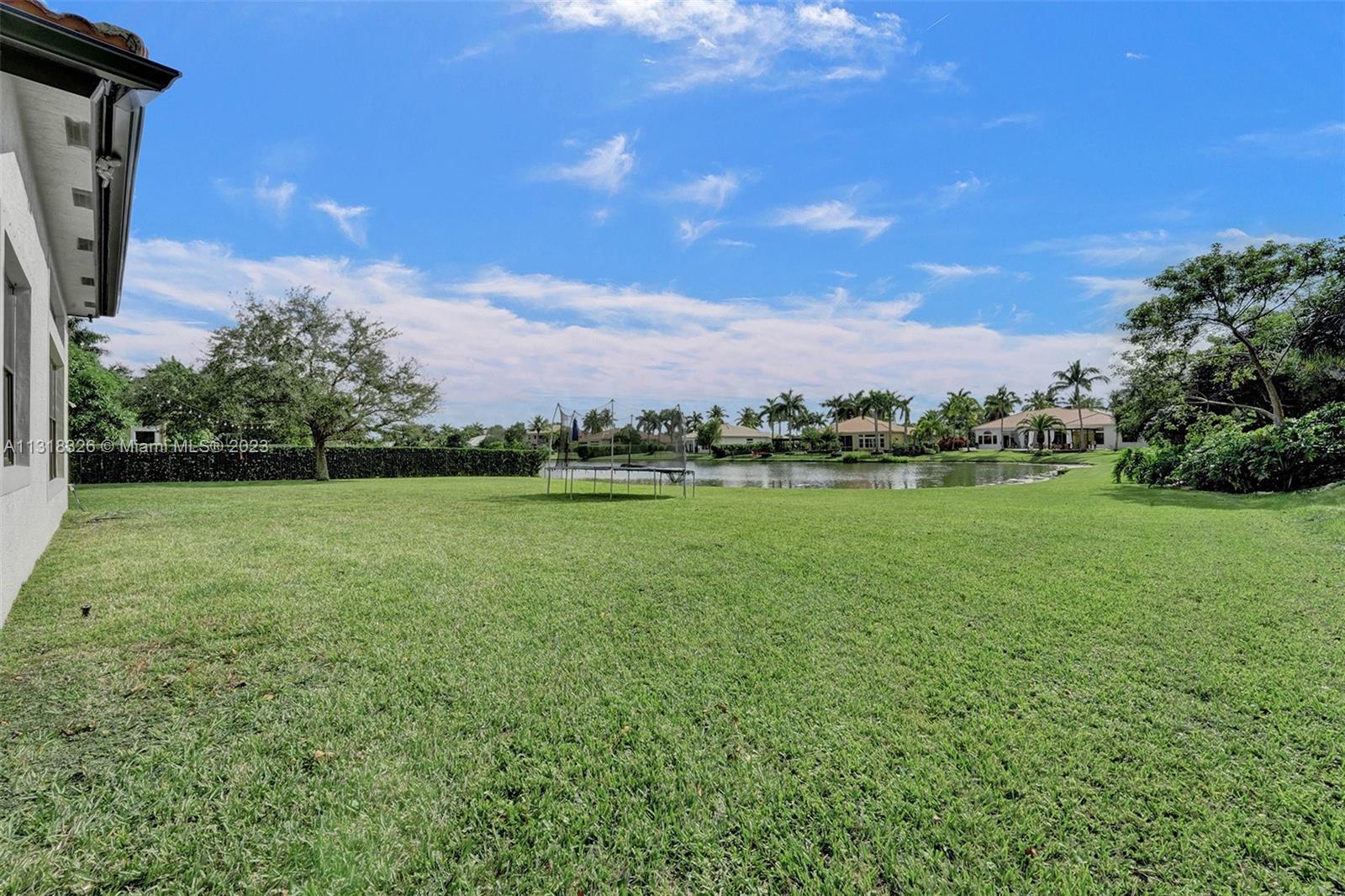 Davie Davie, FL 33331 - Photo 78 of 84 a view of a garden with a building in the background