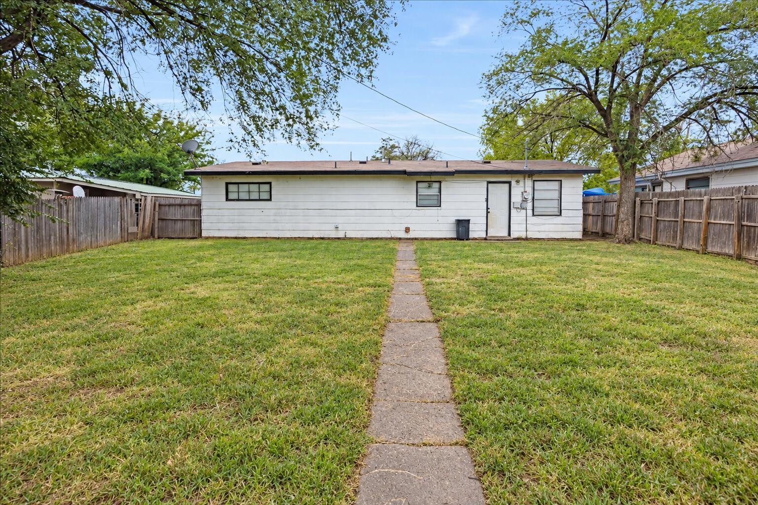 4415 South Hayden Street Amarillo, TX 79110 - Photo 21 of 21 Neatly Mowed Yard with Clean Edges-1