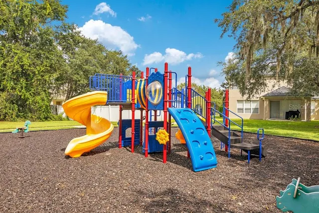 a view of a park with slide