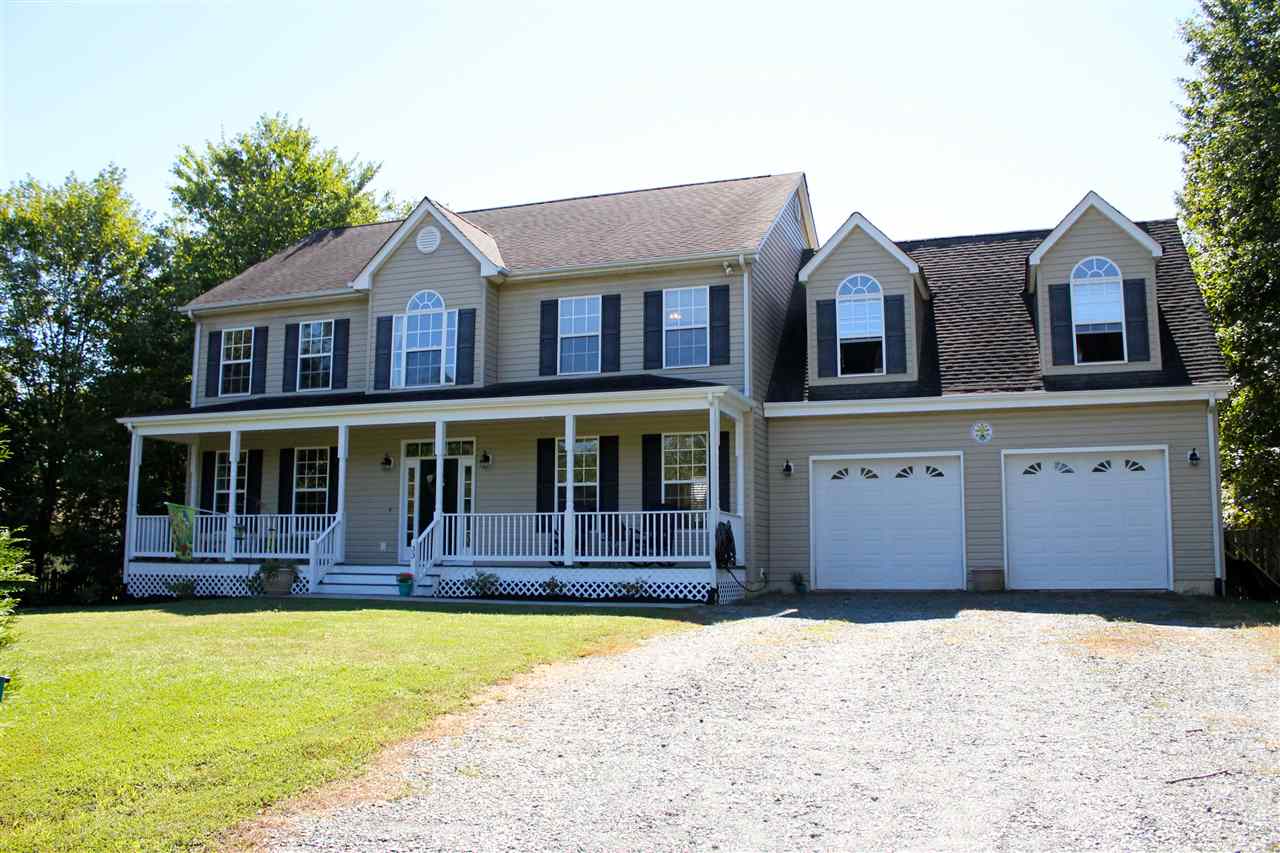 33 Haversack Road Palmyra, VA 22963 - Photo 1 of 22 a front view of a house with a yard