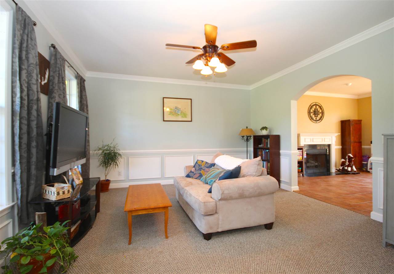 33 Haversack Road Palmyra, VA 22963 - Photo 7 of 22 a living room with furniture and a flat screen tv