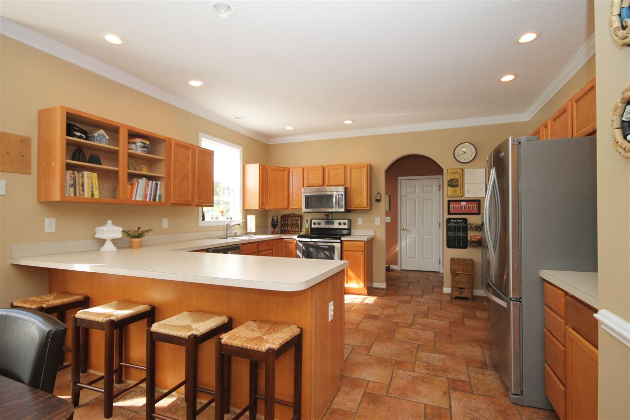 33 Haversack Road Palmyra, VA 22963 - Photo 8 of 22 a large kitchen with a table and chairs
