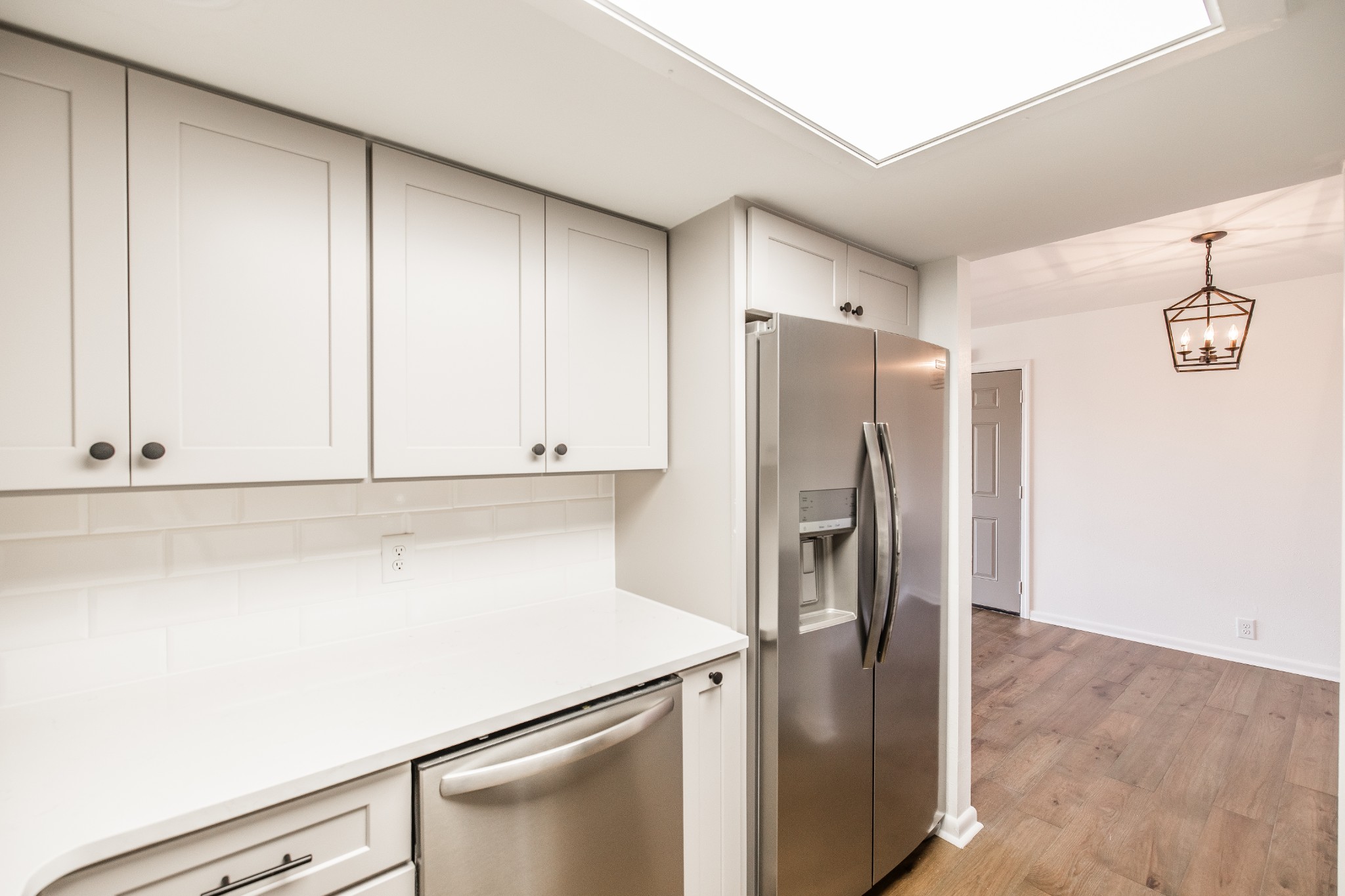 21 Vaughns Gap Road, Unit 55 Nashville, TN 37205 - Photo 14 of 35 a kitchen with metallic refrigerator freezer and a dishwasher
