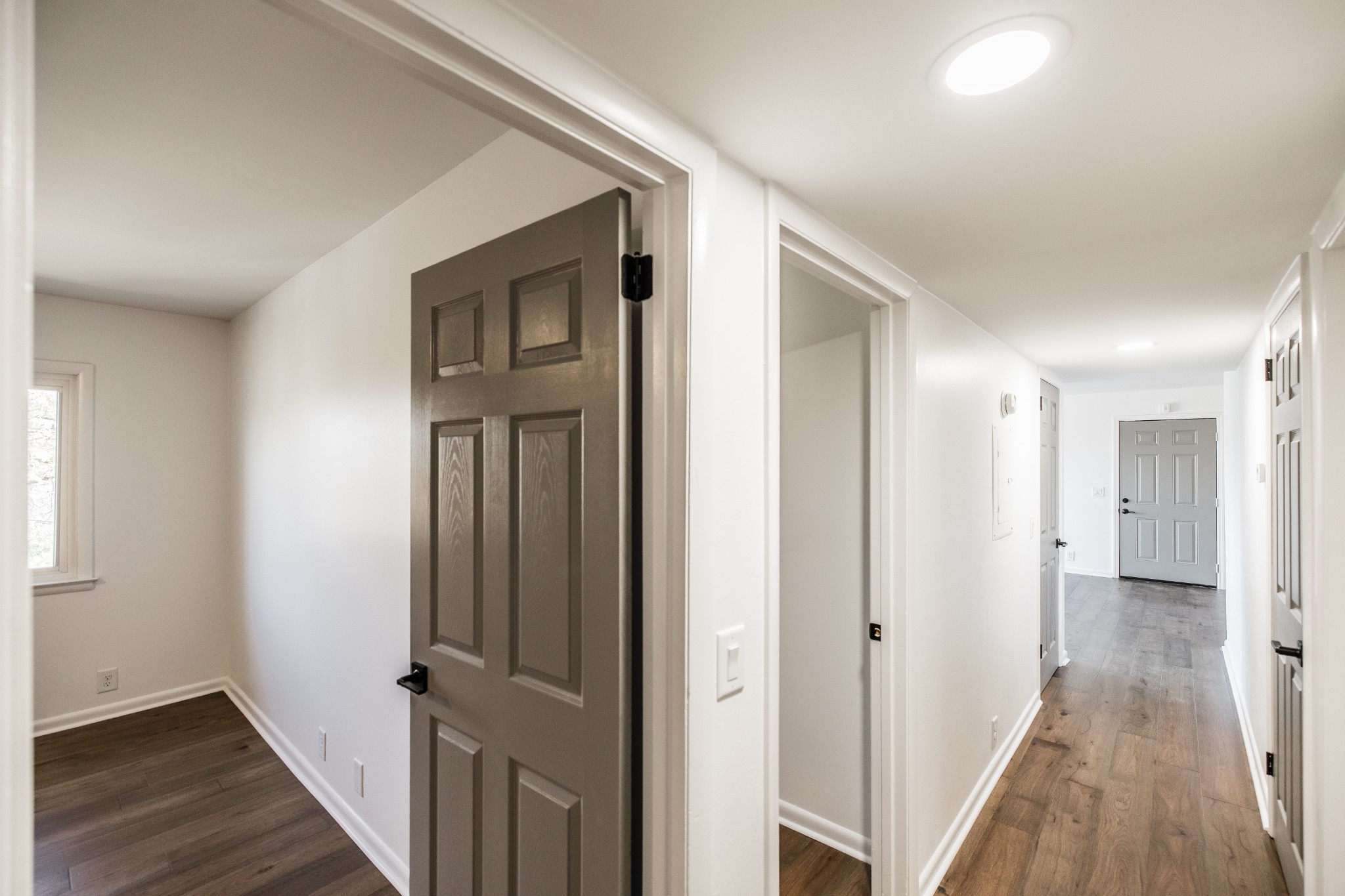 21 Vaughns Gap Road, Unit 55 Nashville, TN 37205 - Photo 17 of 35 a view of a hallway with wooden floor and closet area