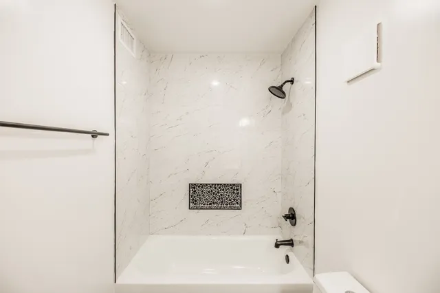a bathroom with shower