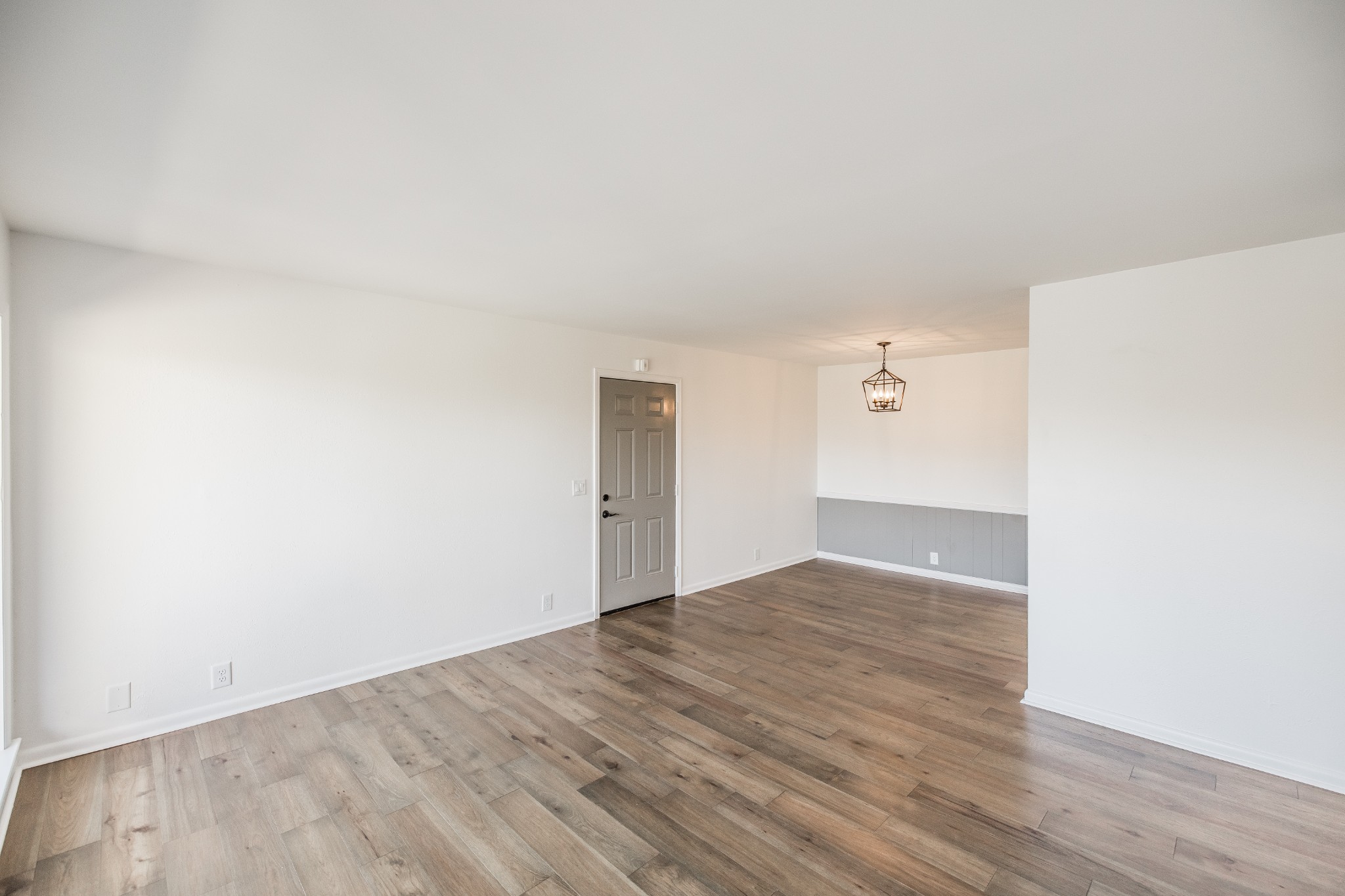 21 Vaughns Gap Road, Unit 55 Nashville, TN 37205 - Photo 10 of 35 a view of an empty room and wooden floor