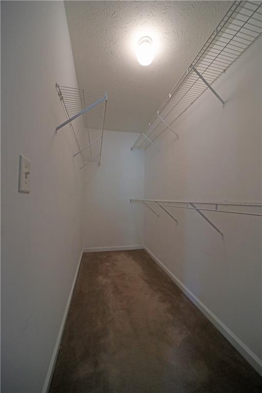 6874 Mahonia Place Lithonia, GA 30038 - Photo 16 of 27 an empty room with an entryway