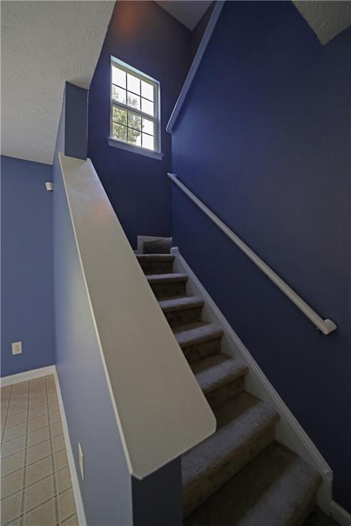 6874 Mahonia Place Lithonia, GA 30038 - Photo 10 of 27 a view of entryway and hall with wooden floor