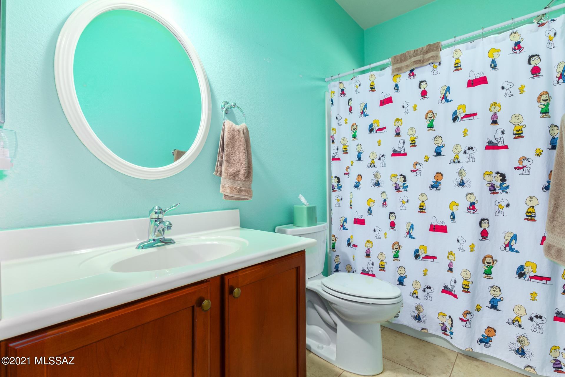 20894 East Founders Road Red Rock, AZ 85145 - Photo 21 of 27 a bathroom with a sink a toilet and a mirror