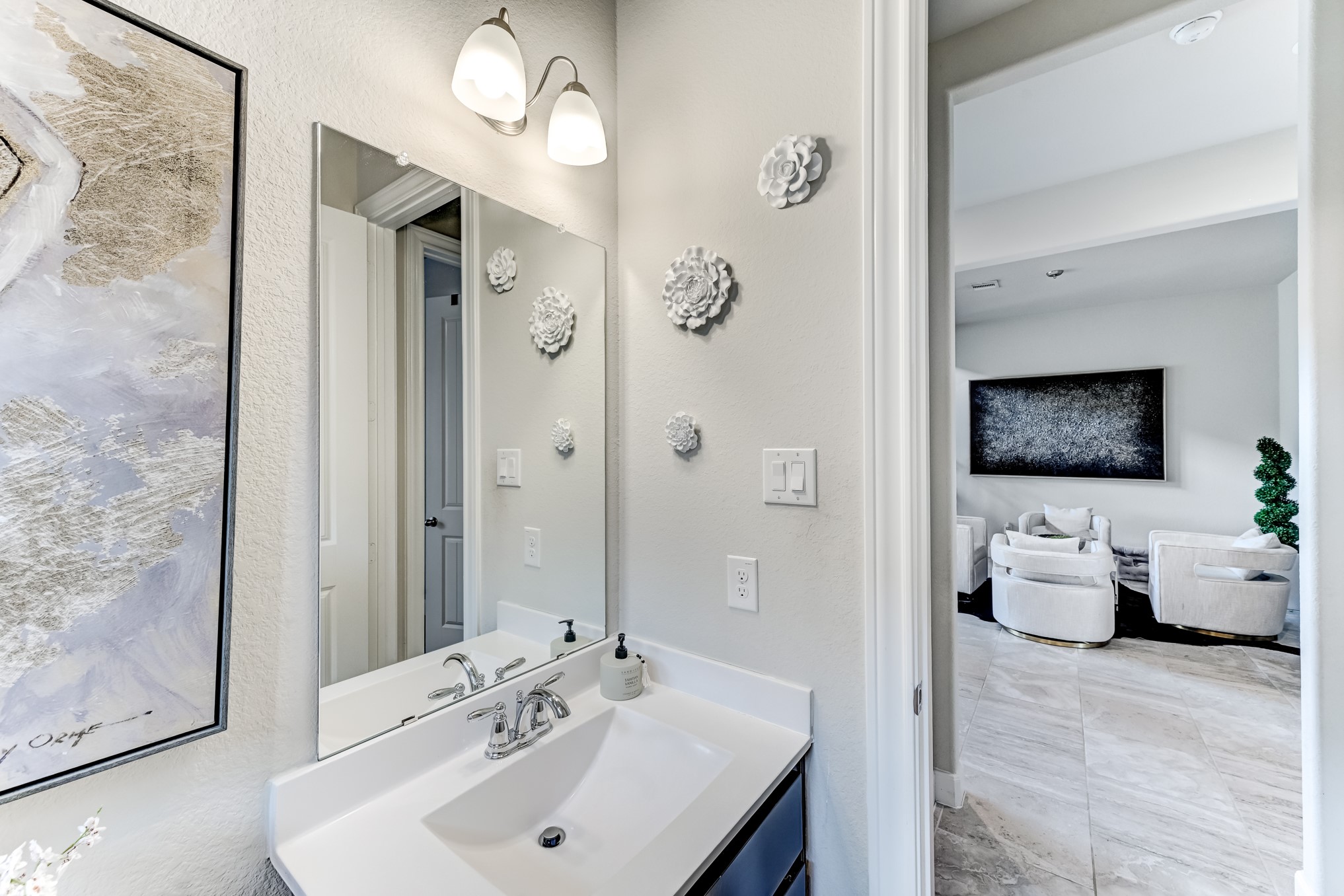 5806 Metaphor Way Rosenberg, TX 77469 - Photo 30 of 50 a en suite spacious bathroom with a double vanity sink and mirror