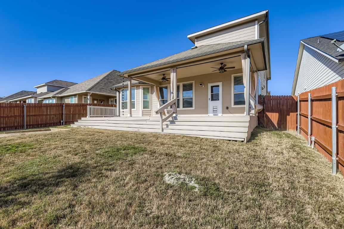 19433 Colgin Drive Pflugerville, TX 78660 - Photo 26 of 29 a front view of a house with a yard
