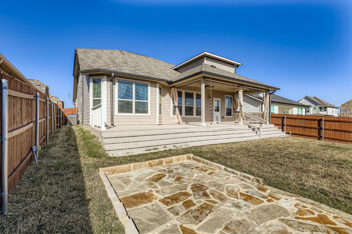 19433 Colgin Drive Pflugerville, TX 78660 - Photo 27 of 29 a front view of a house with a yard