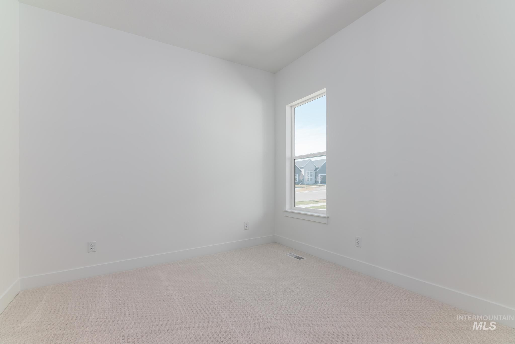 9800 West Novato Street Star, ID 83669 - Photo 23 of 40 Carpeted empty room with baseboards