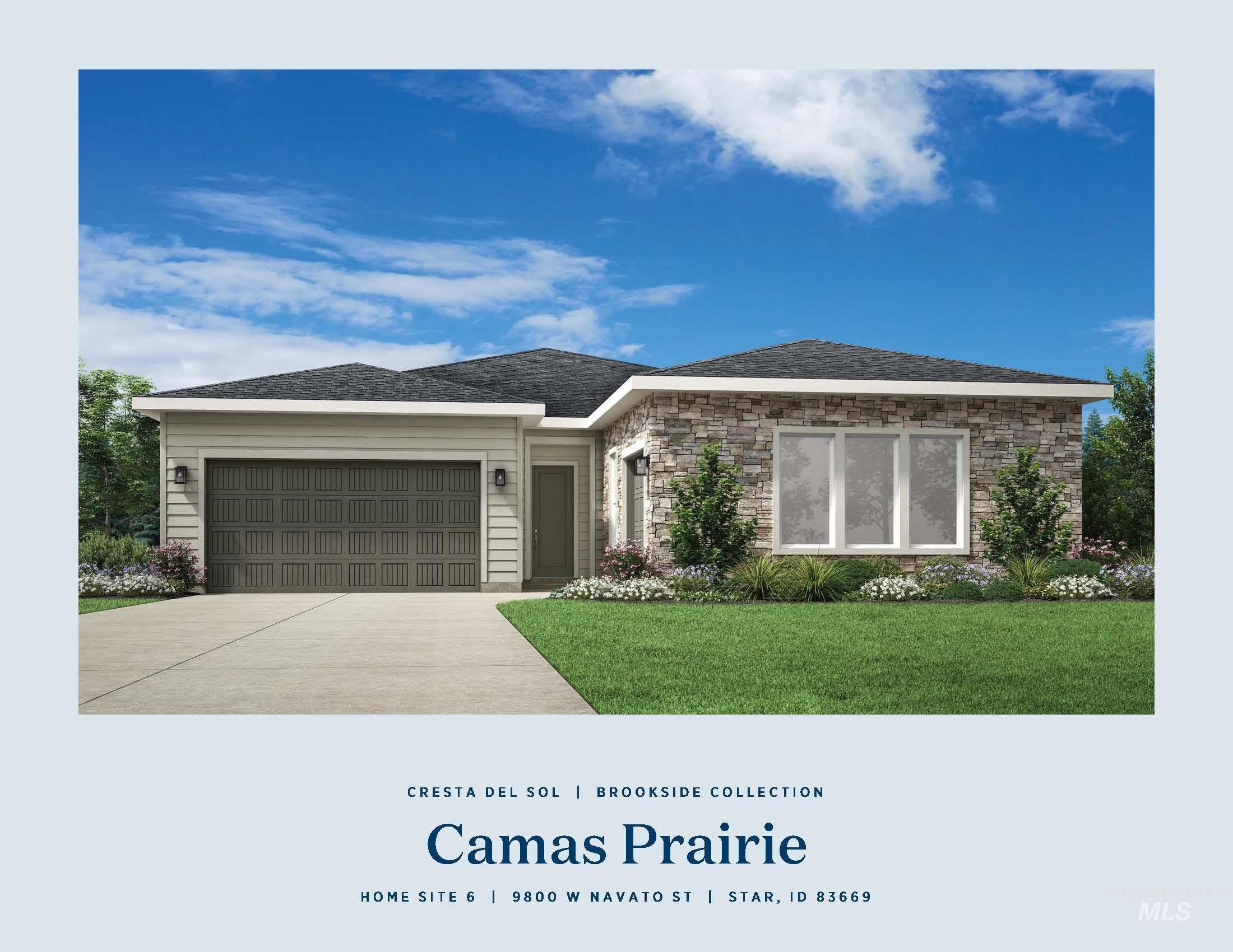 9800 West Novato Street Star, ID 83669 - Photo 31 of 40 View of front of house with stone siding, a garage, driveway, a front yard, and roof with shingles