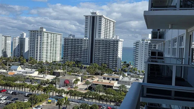 a city street filled with lots of tall buildings