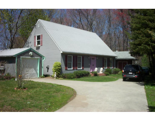 1976 Wilbraham Road Springfield, MA 01129 - Photo 3 of 12 a front view of a house with a garden