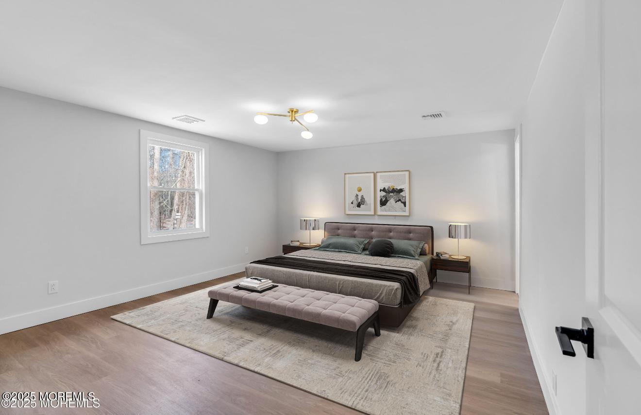 23 A Stoney Hill Road Cream Ridge, NJ 08514 - Photo 19 of 46 a bedroom with furniture and a window