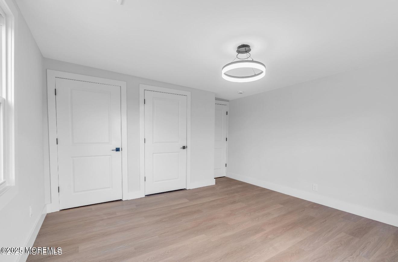 23 A Stoney Hill Road Cream Ridge, NJ 08514 - Photo 25 of 46 a view of a room with wooden floor and natural light