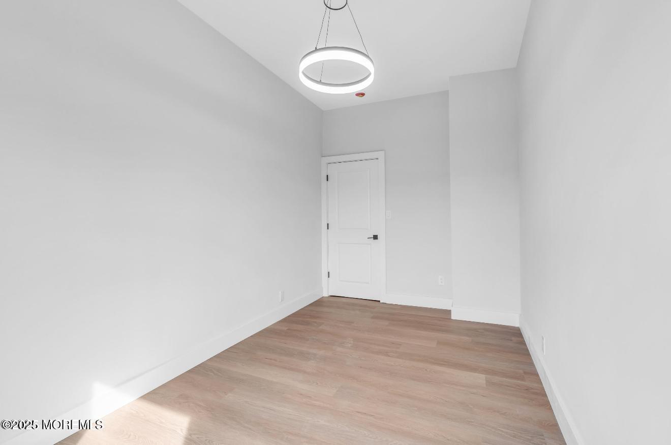 23 A Stoney Hill Road Cream Ridge, NJ 08514 - Photo 28 of 46 a view of a room with wooden floor and white walls