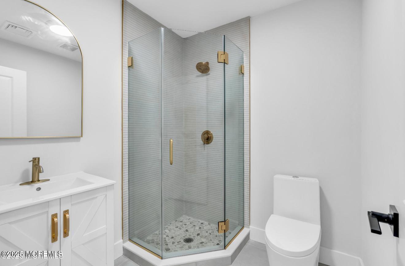 23 A Stoney Hill Road Cream Ridge, NJ 08514 - Photo 35 of 46 a bathroom with a sink a toilet and shower