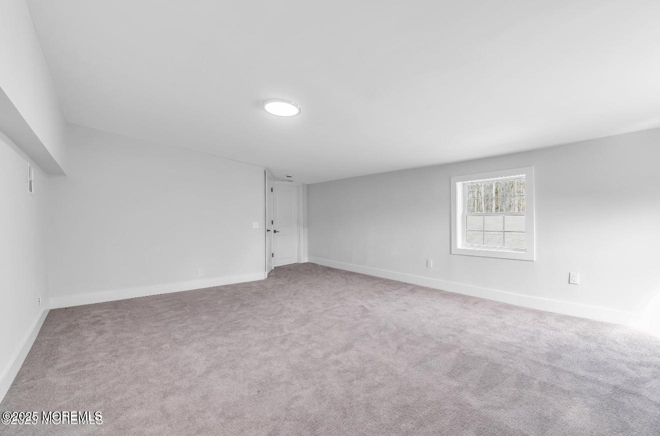 23 A Stoney Hill Road Cream Ridge, NJ 08514 - Photo 38 of 46 a view of an empty room with a window