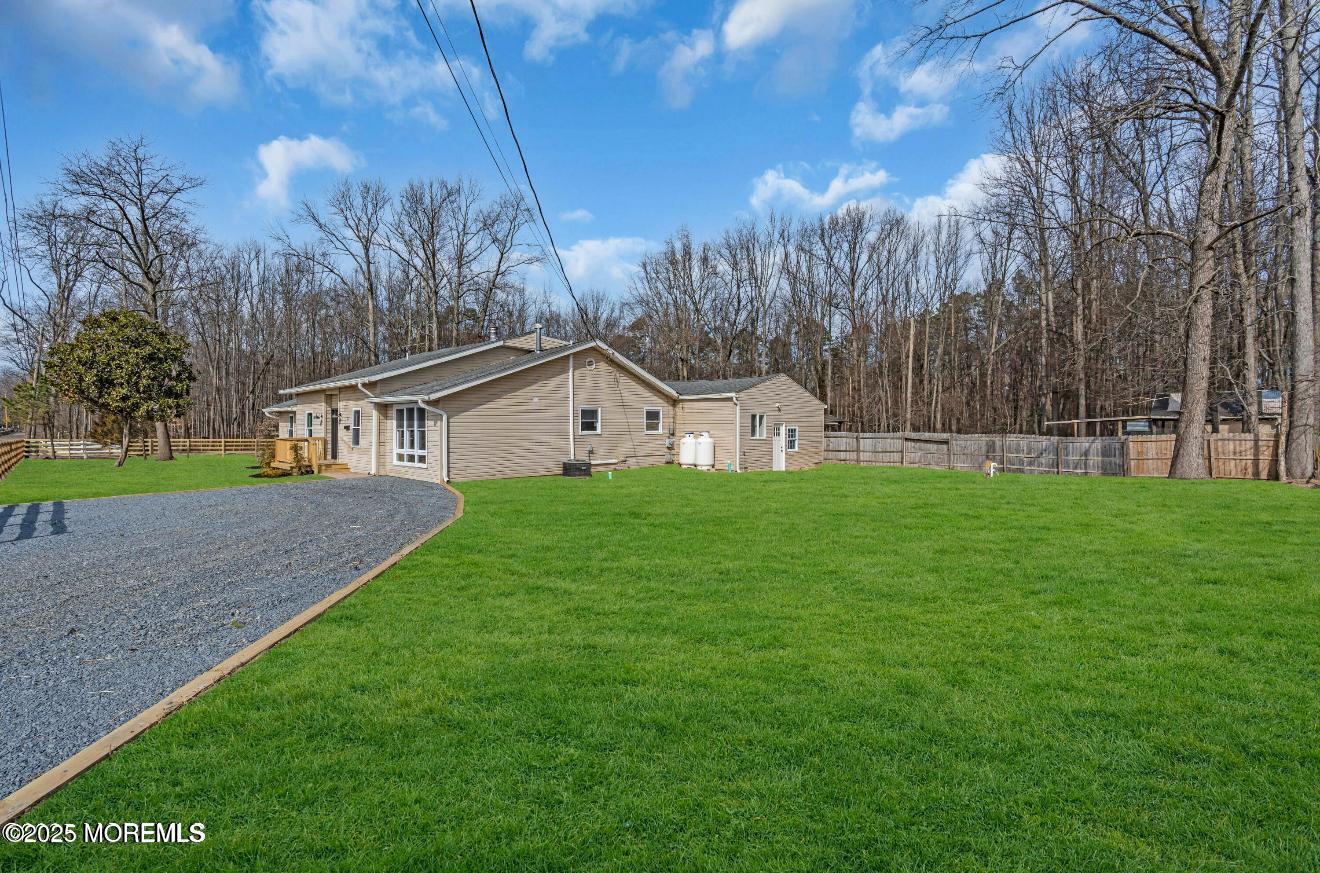 23 A Stoney Hill Road Cream Ridge, NJ 08514 - Photo 46 of 46 a front view of house with yard and green space