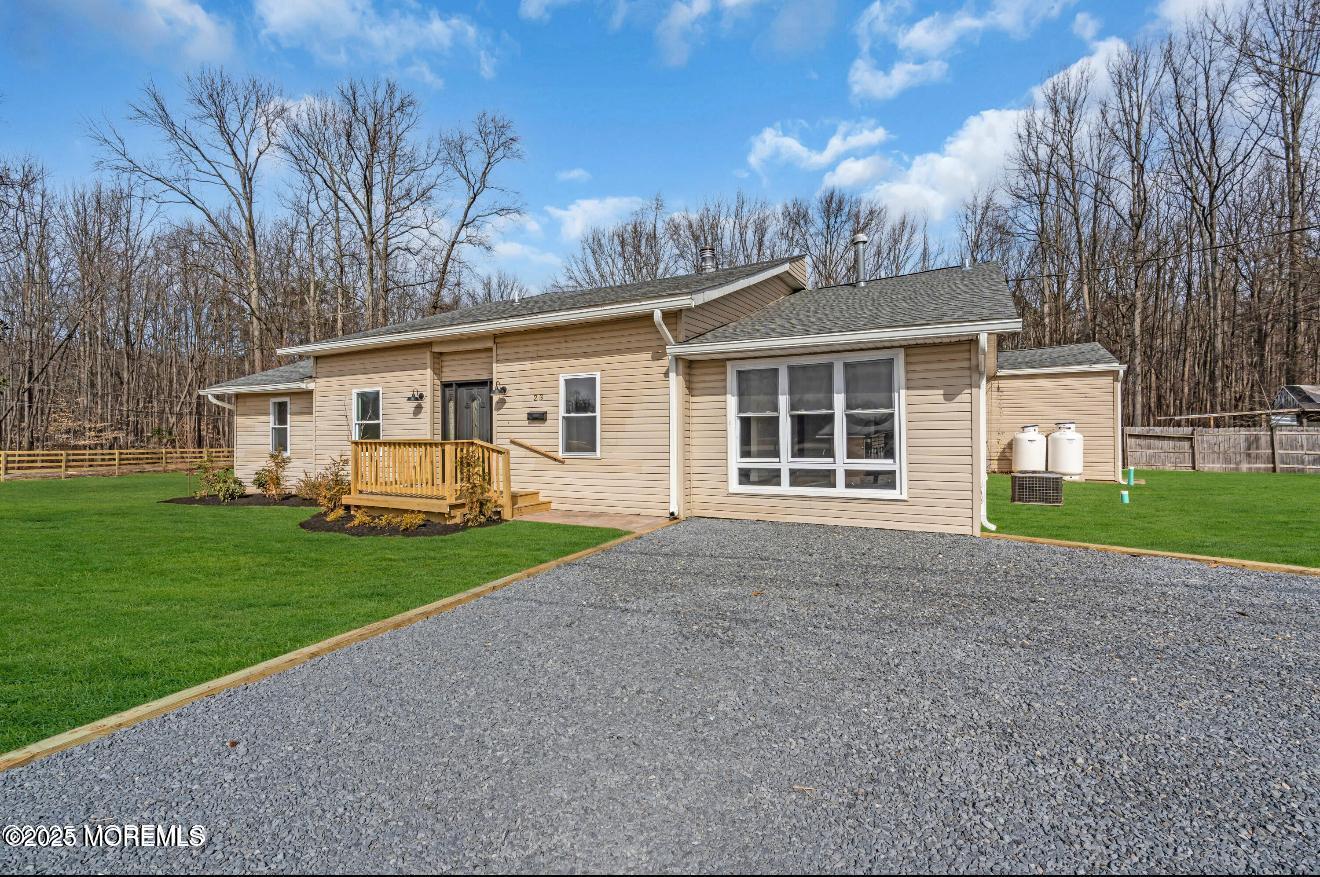 23 A Stoney Hill Road Cream Ridge, NJ 08514 - Photo 5 of 46 a view of a house with backyard and garden