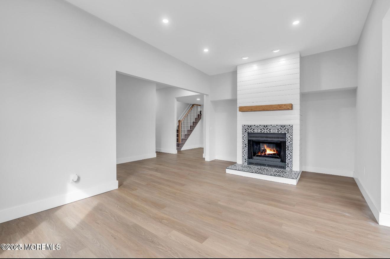 23 A Stoney Hill Road Cream Ridge, NJ 08514 - Photo 8 of 46 a view of empty room with a fireplace