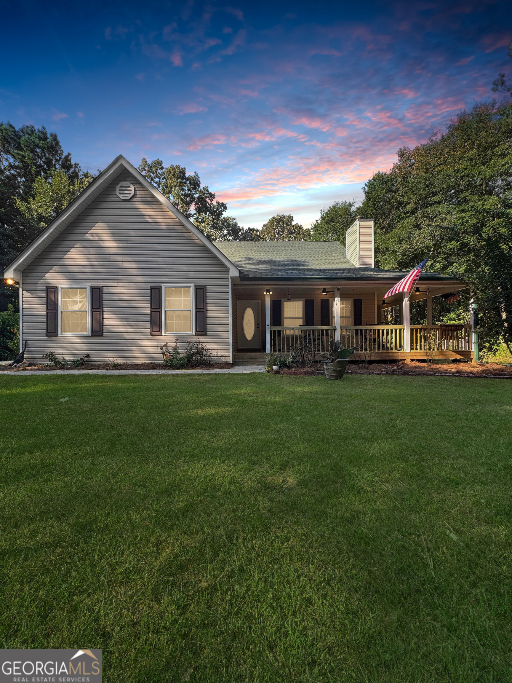 334 Barnetts Bridge Road Jackson, GA 30233 - Photo 1 of 1 a front view of house with yard and green space