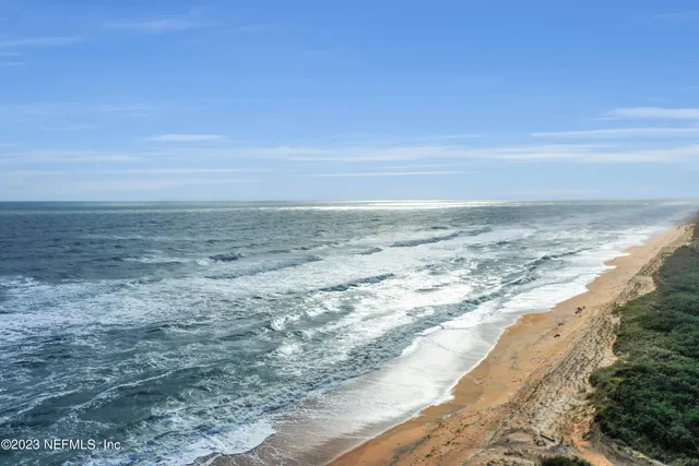 a view of beach and ocean