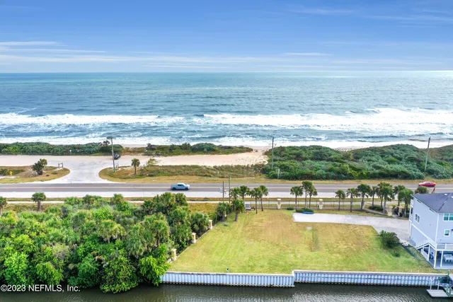 a view of a swimming pool with an ocean view