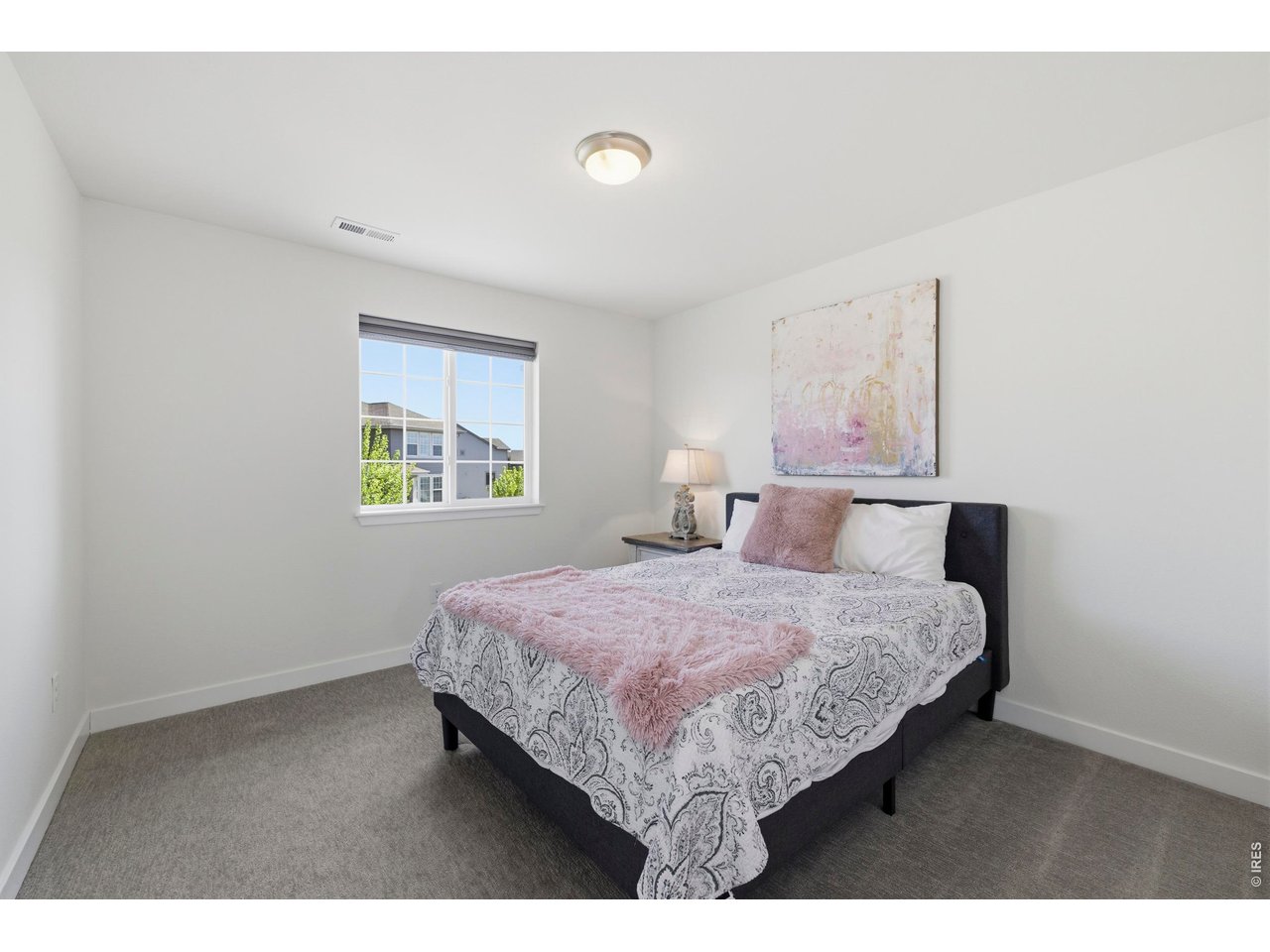 2910 Water View Street Timnath, CO 80547 - Photo 28 of 50 a bedroom with a bed and a window