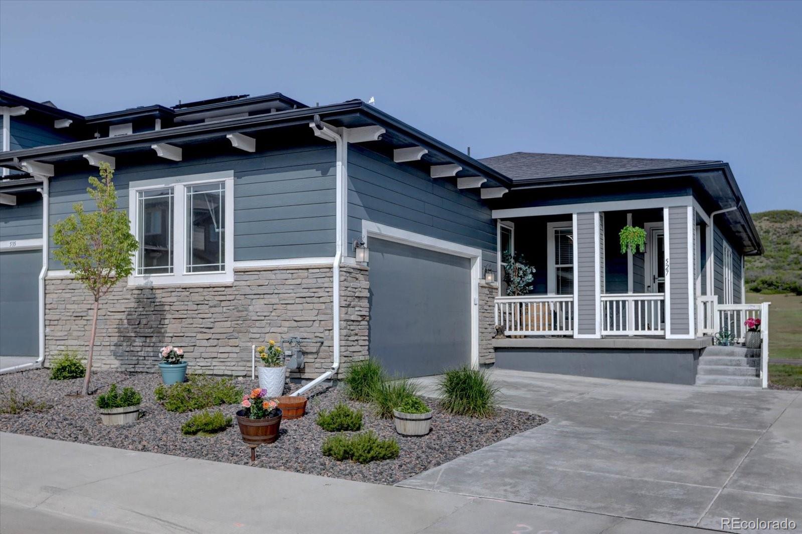 front view of a house with a small yard