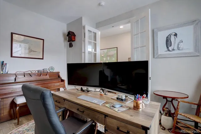 a view of a workspace with furniture