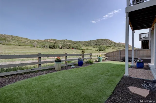 a view of a garden with an ocean