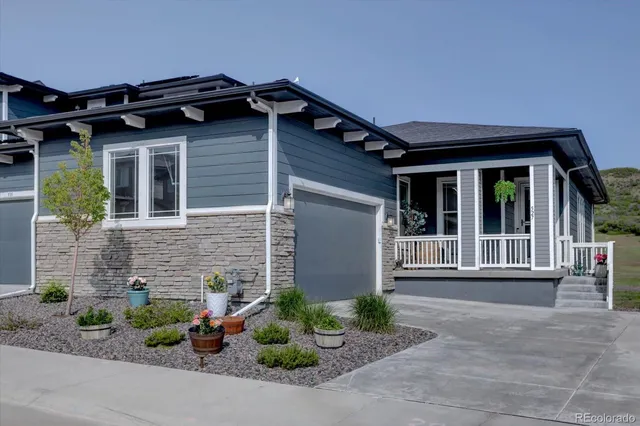 front view of a house with a small yard