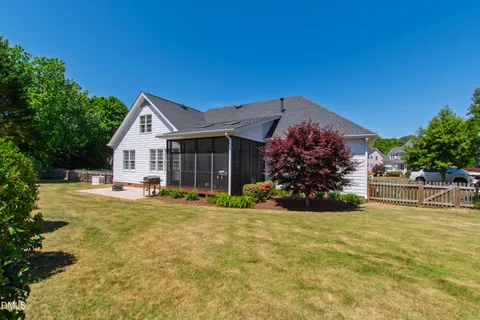 a front view of a house with yard
