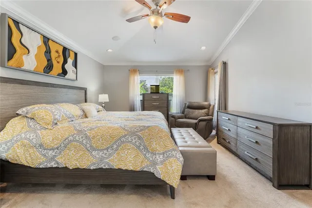 a bedroom with bed and window