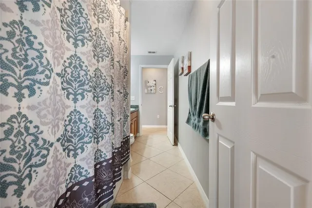 a hallway with a wooden door