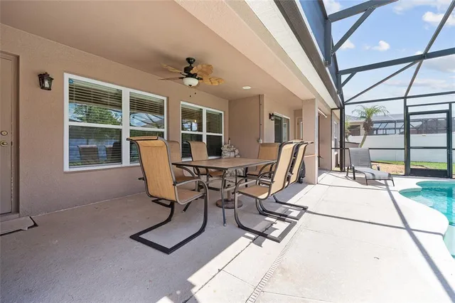 a view of a work space with furniture and a rug