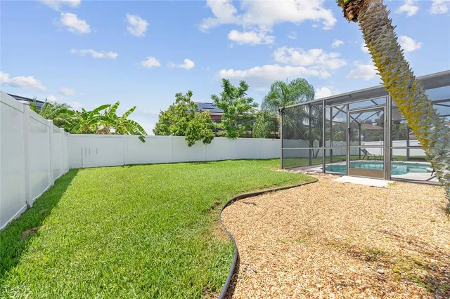 a view of a backyard with a garden