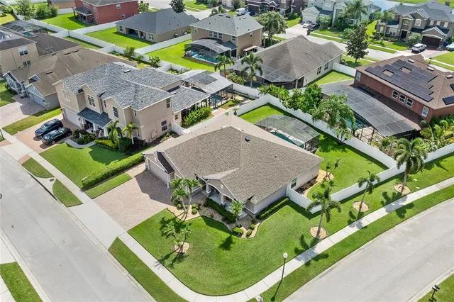 an aerial view of a house with a garden