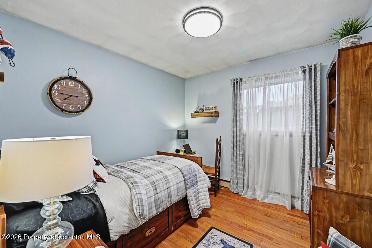 121 T Rt 351 Moscow, PA 18444 - Photo 55 of 79 a bedroom with a bed and a window