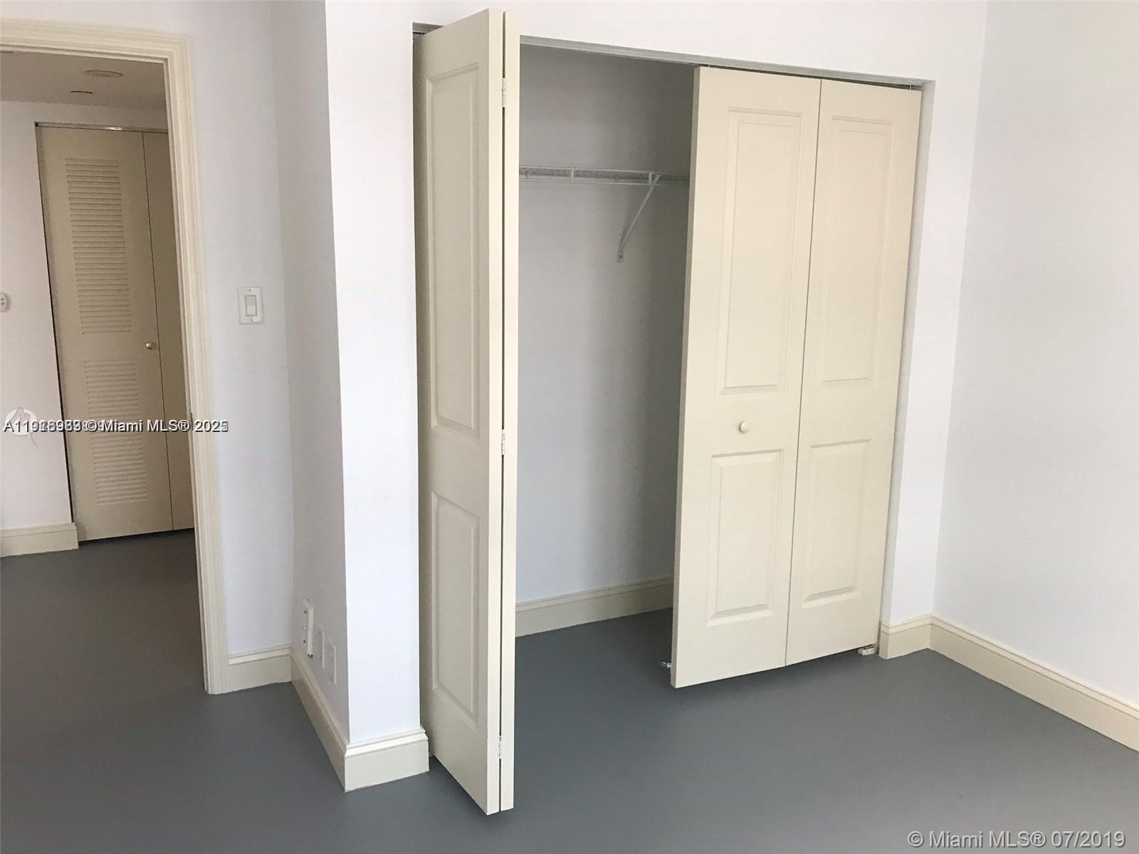 111 East Flagler Street, Unit 803 Miami, FL 33131 - Photo 6 of 16 a view of an empty room