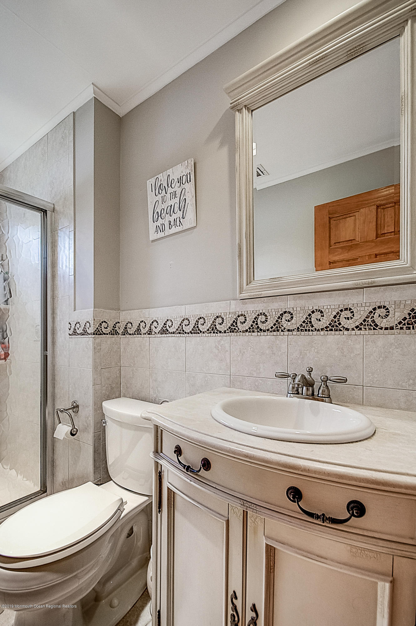 2302 Oak Tree Road Point Pleasant, NJ 08742 - Photo 30 of 48 a bathroom with a sink and a toilet