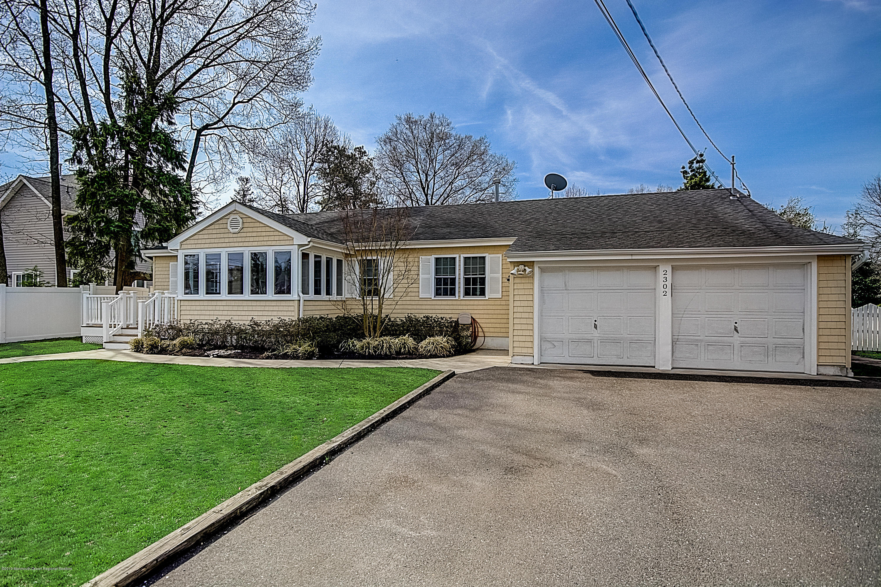 2302 Oak Tree Road Point Pleasant, NJ 08742 - Photo 3 of 48 a view of a house with a yard and tree