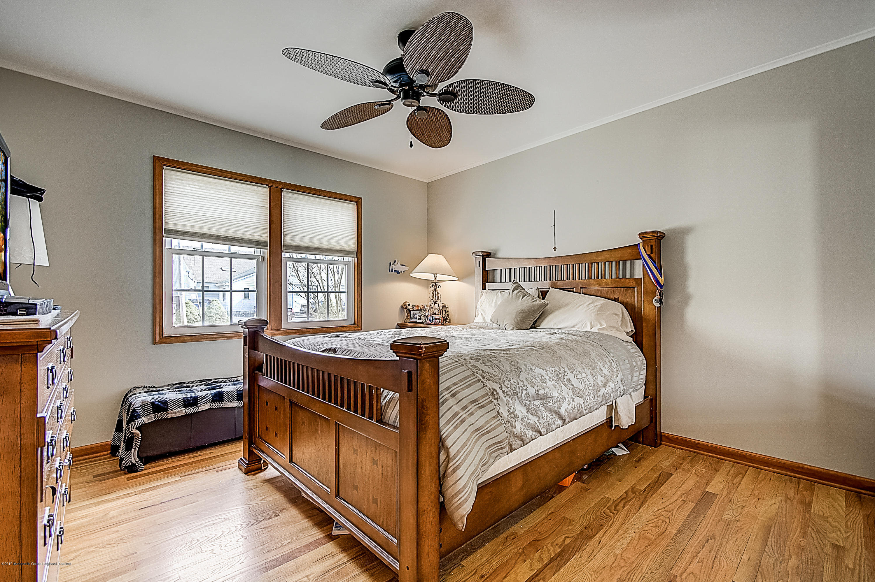 2302 Oak Tree Road Point Pleasant, NJ 08742 - Photo 33 of 48 a bed room with a bed and a window