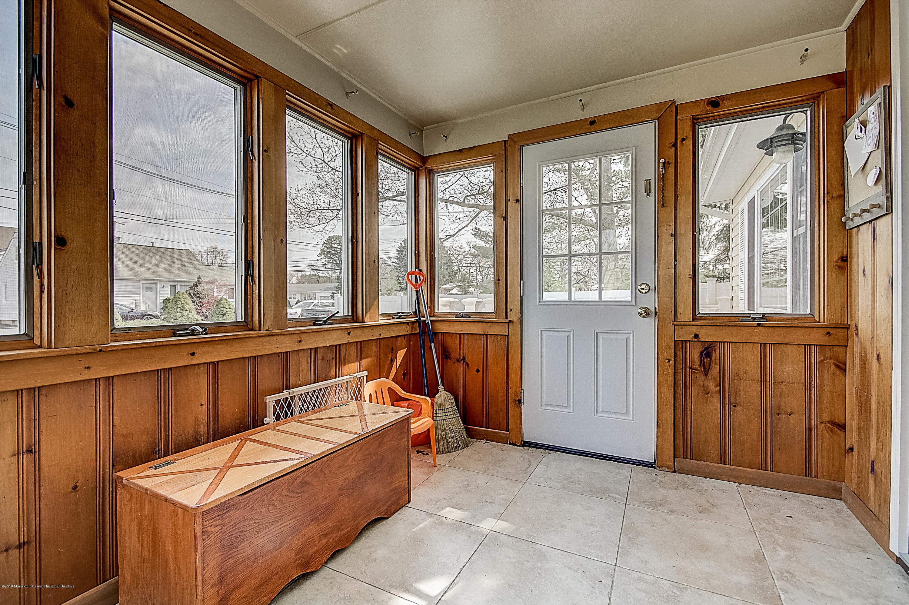 2302 Oak Tree Road Point Pleasant, NJ 08742 - Photo 39 of 48 a living room with furniture and large windows