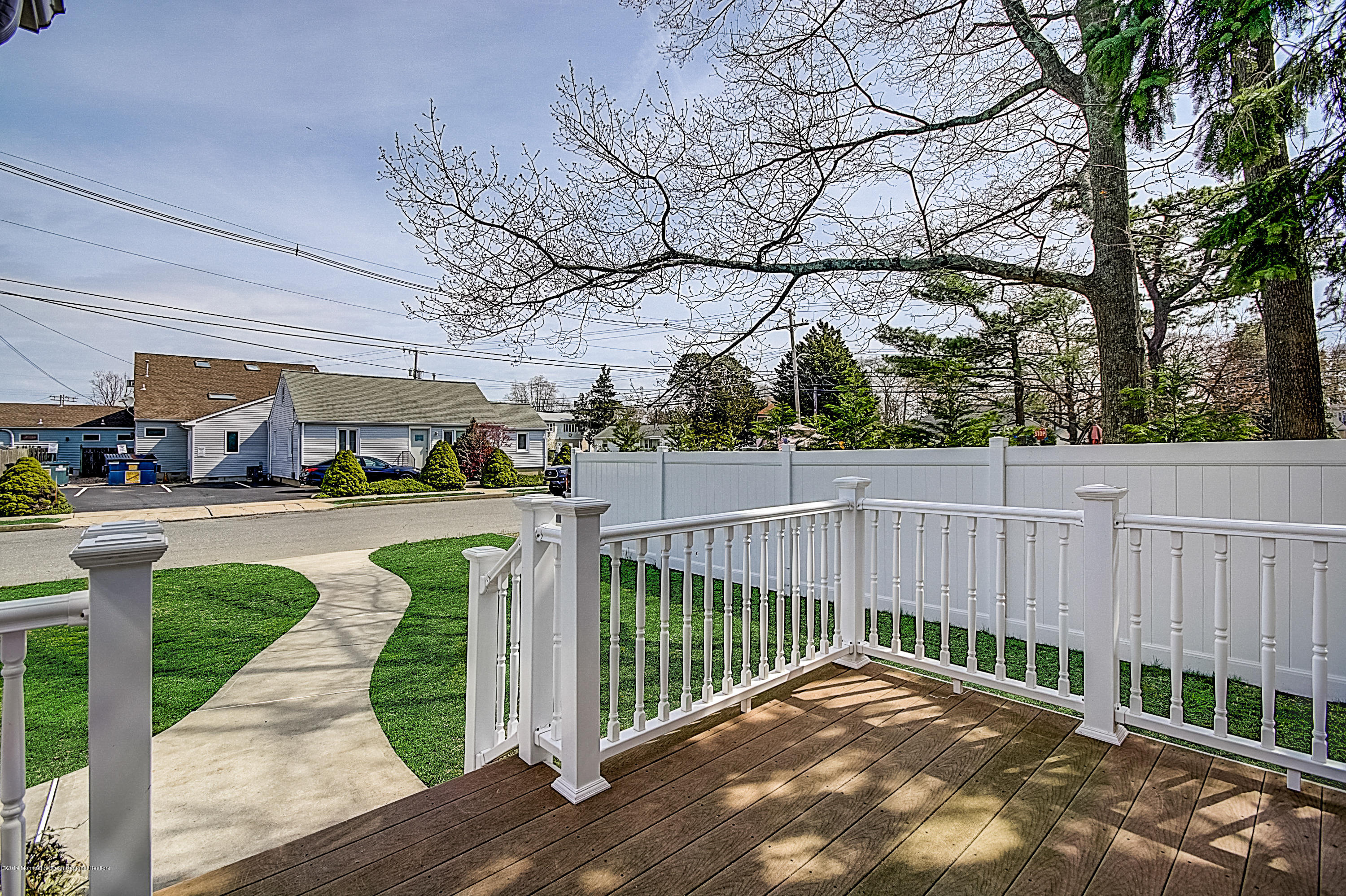 2302 Oak Tree Road Point Pleasant, NJ 08742 - Photo 4 of 48 a view of a deck with a yard