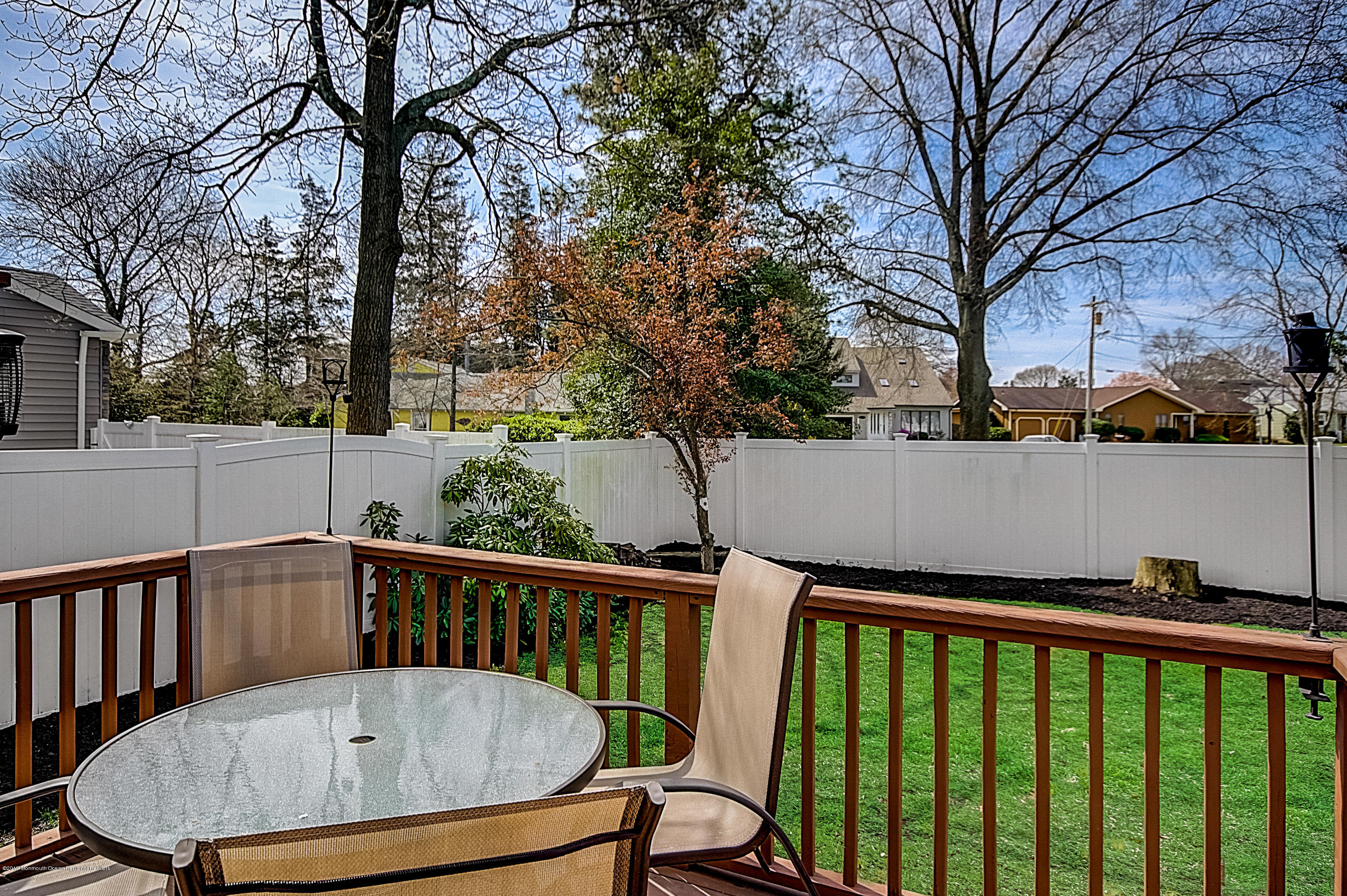 2302 Oak Tree Road Point Pleasant, NJ 08742 - Photo 48 of 48 a view of a balcony with wooden floor and outdoor space